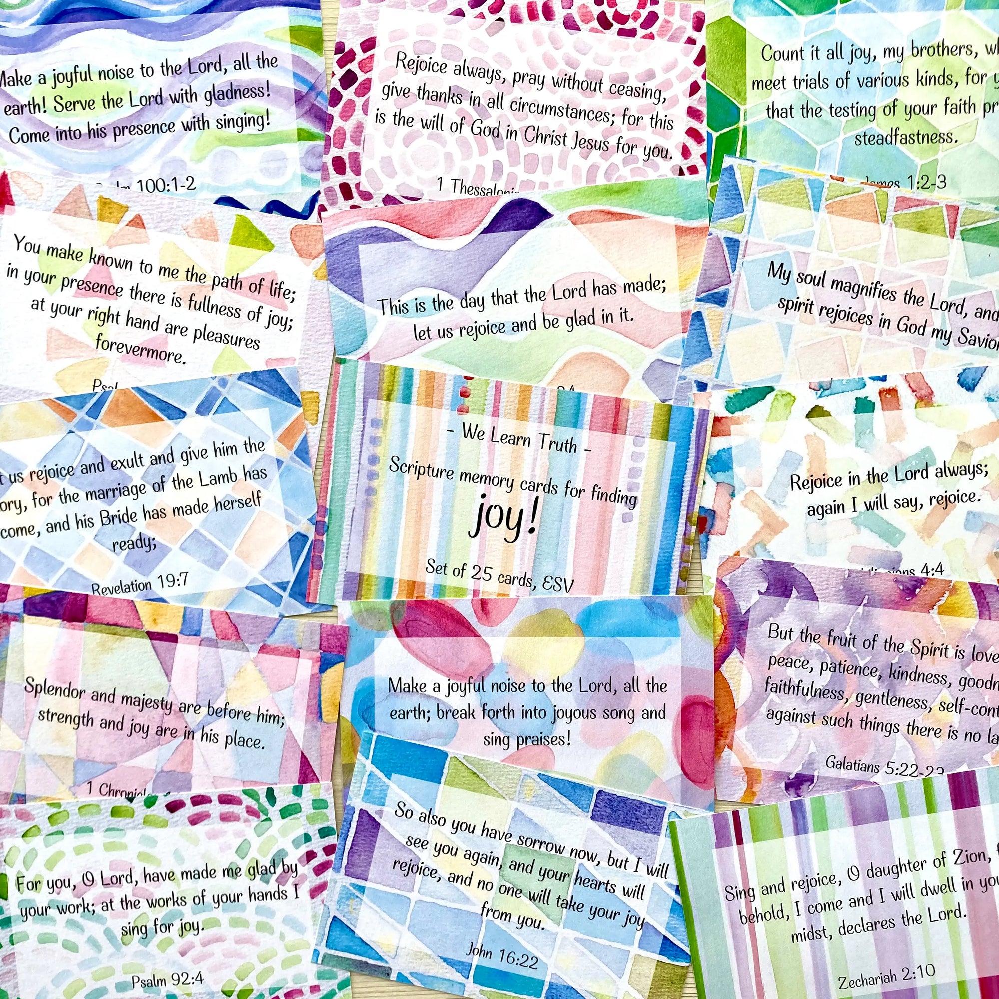 Collage of colorful Scripture memory cards with hand-painted designs and various verses about joy. 