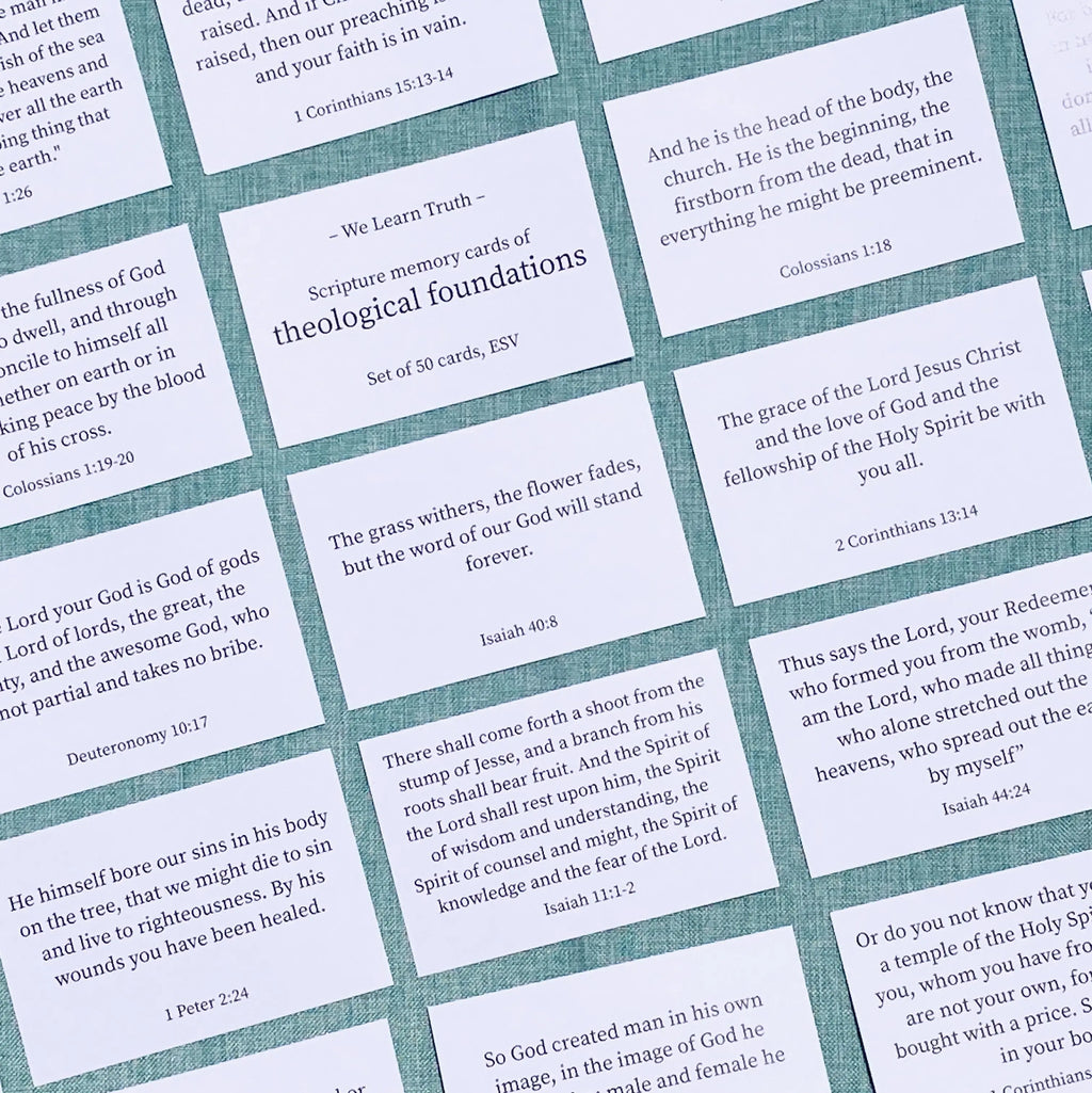 Set of scripture memory cards with text on a textured surface