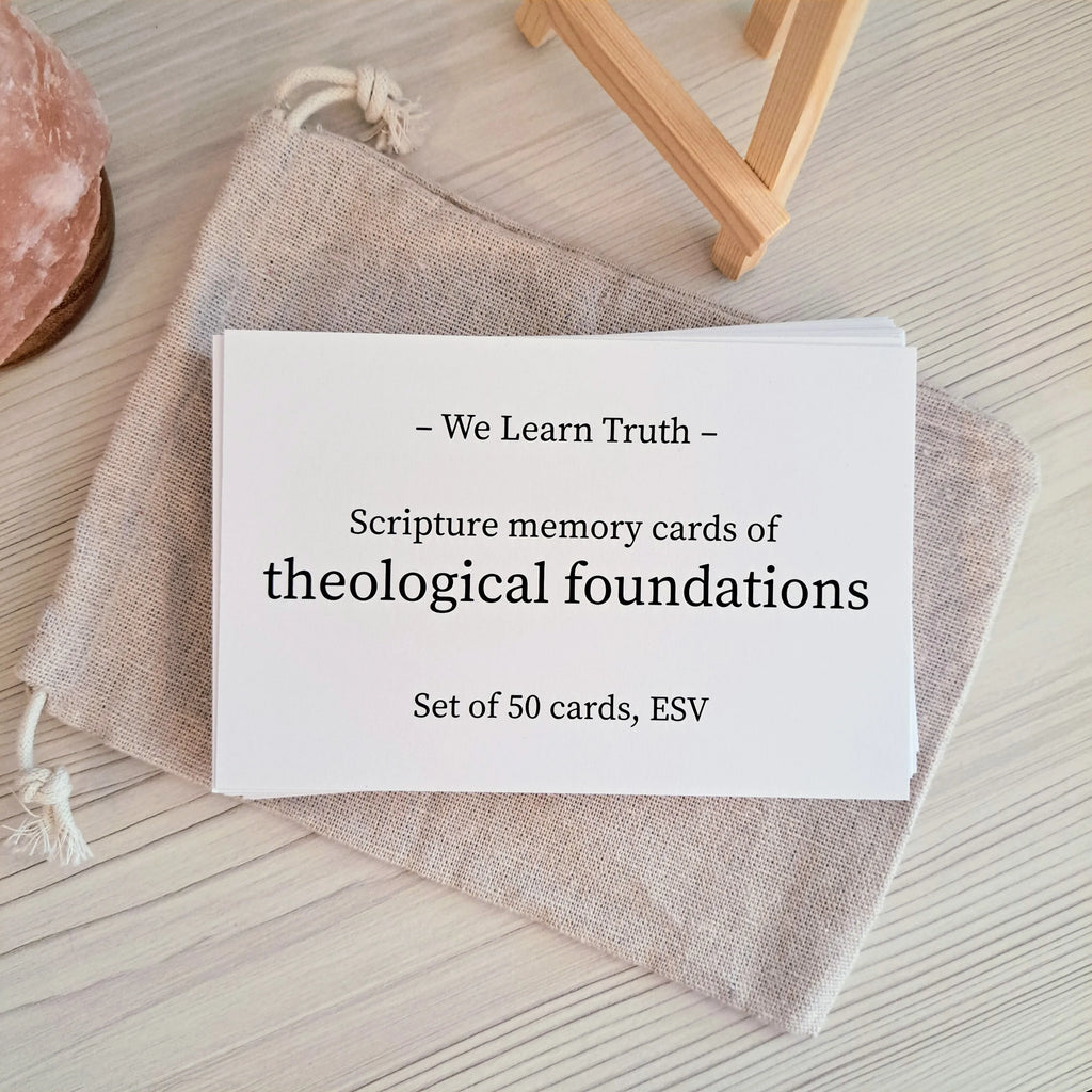 Set of theological foundations scripture memory cards on a canvas bag with an easel on the side.